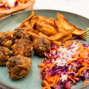 Greek meatballs, chips and salad - Anastasia